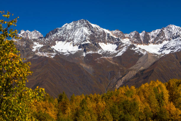 istock Humped peak of Mount Ushba, Georgia. 700688600