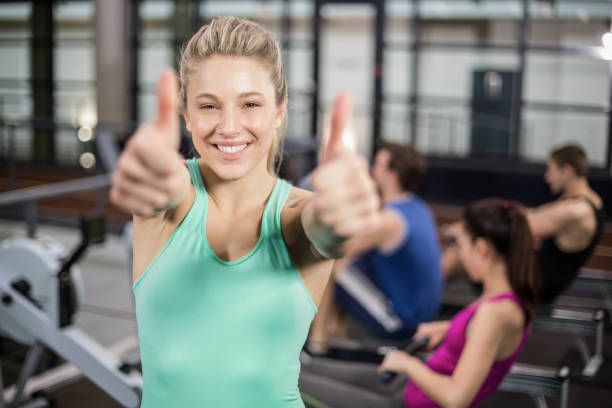 istock Sportswoman showing thumbs up 700689102