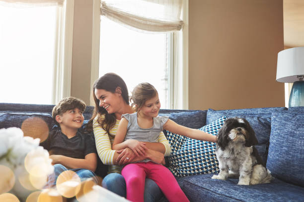 istock Mom and her three little angels 700692210