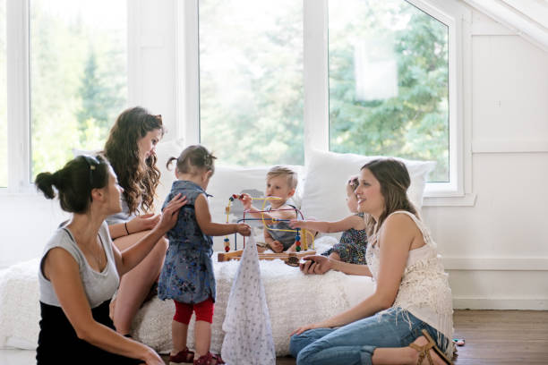 istock Babies and mothers meeting 700693256