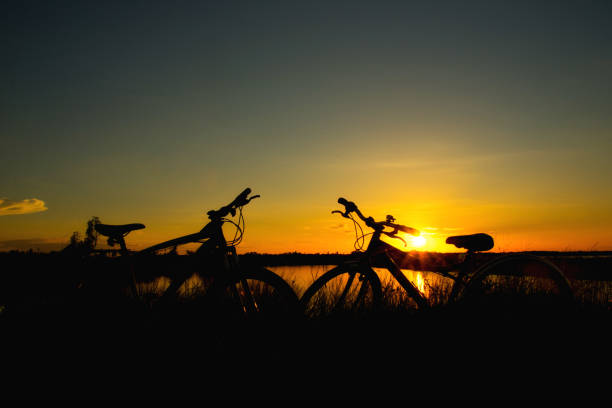 istock Bike on sunset background. 700697444