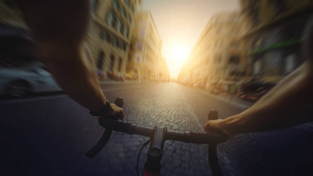 istock POV commuter riding a road racing bicycle in Rome 700697748