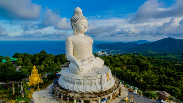 istock aerial photography white great Phuket’s big Buddha in blue sky. 700698084