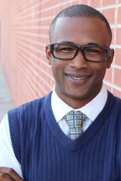 istock Dark-skinned businessman with classic glasses 700709680
