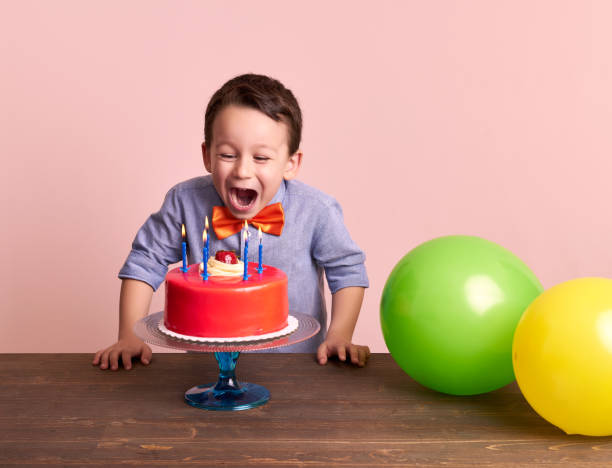 istock Birthday party for cute child. 700710364