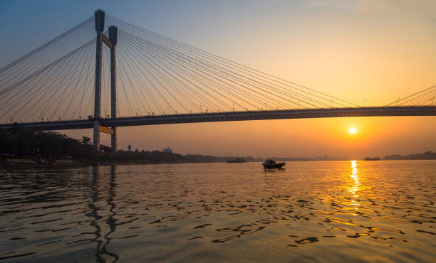 istock Scenic sunset at Vidyasagar Setu (bridge) on river Hooghly. 700722186
