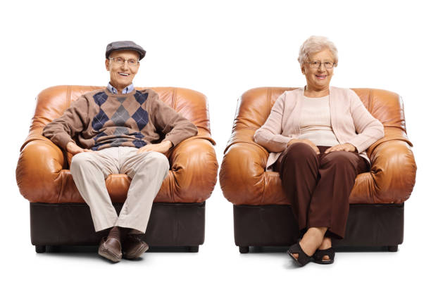 istock Seniors sitting in leather armchairs 700728674