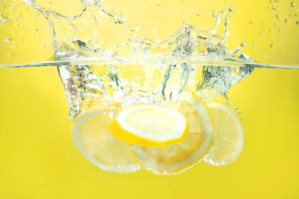 Splashing Lemons stock photo