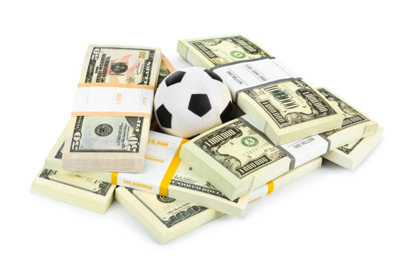 istock Money and soccer ball 700761472