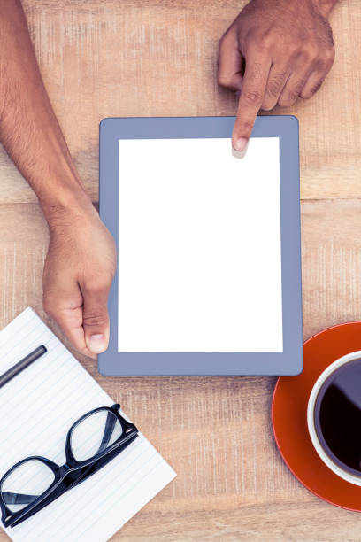 istock Cropped image of person using on digital tablet 700763952
