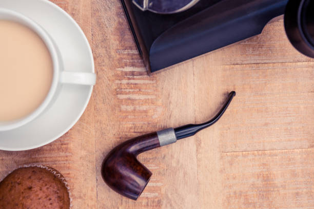 istock Close-up of coffee and smoking pipe 700769456