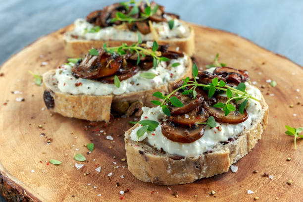 istock Garlic mushroom toast with creamy herbed ricotta chees spread 700770818