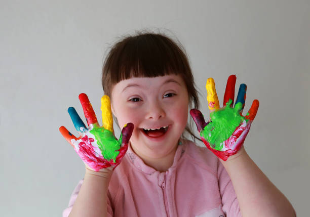 istock Cute little girl with painted hands 700773436