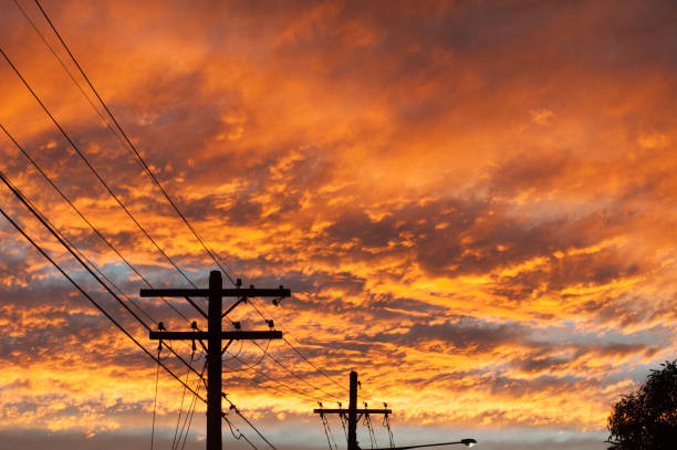 istock Landscape with orange sunset and clouds 700777118