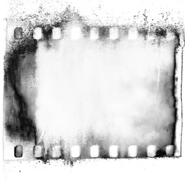 istock Black and white grunge film strip frame on dripping background. 700781694