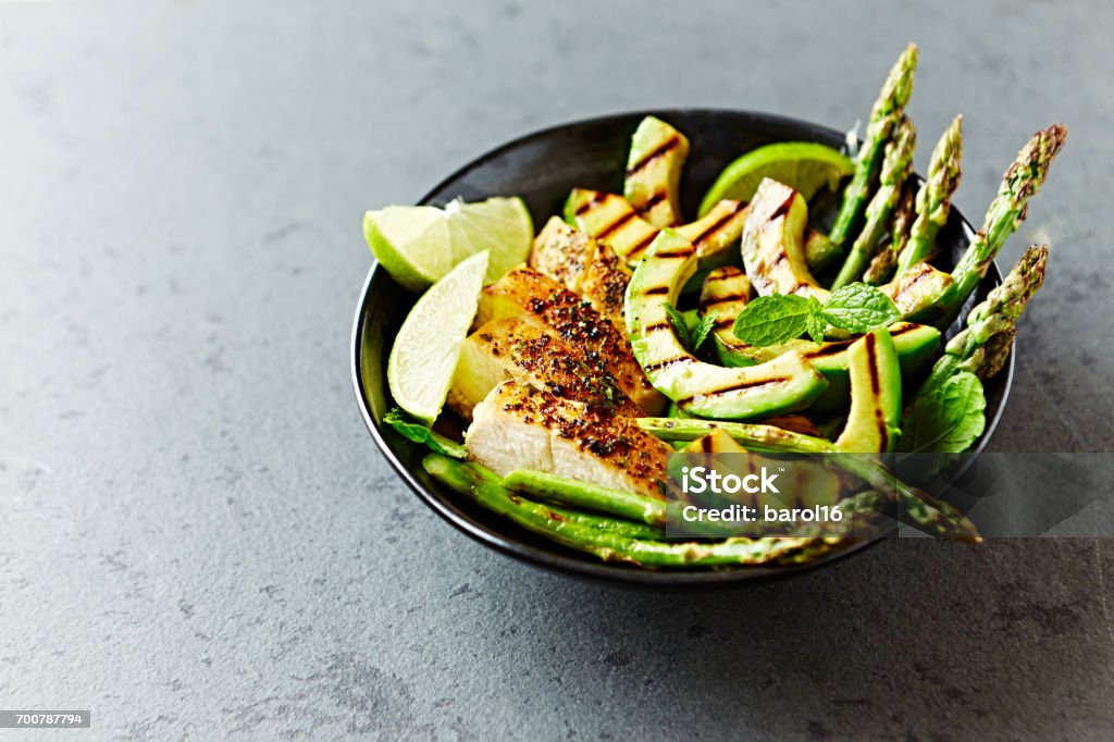 Grilled Chicken Salad with Grilled Avocado and Asparagus Asparagus Stock Photo