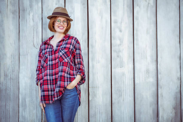 istock smiling hipster woman with her hand in her pocket 700799658