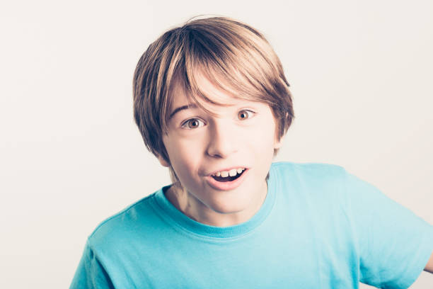 istock little surprised  boy -  filtered retro style 700801942