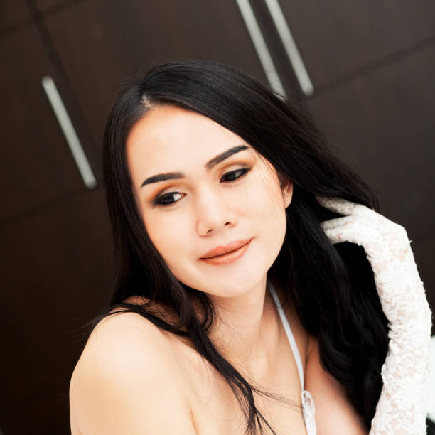 istock Transgender portrait with long white glove 700810478