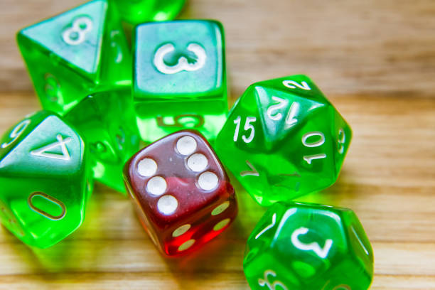 istock A beautiful winning playing dice rolled on a side on wooden table 700813974