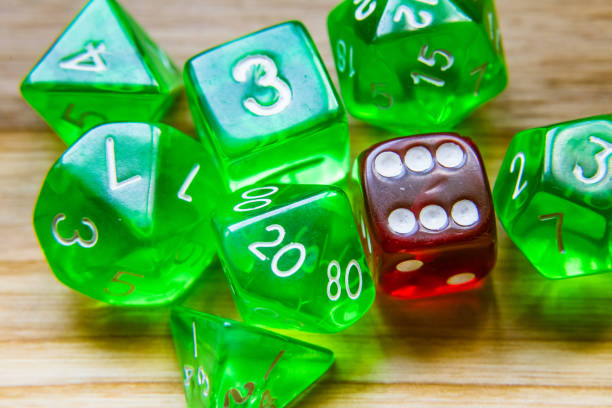 istock A beautiful winning playing dice rolled on a side on wooden table 700814026