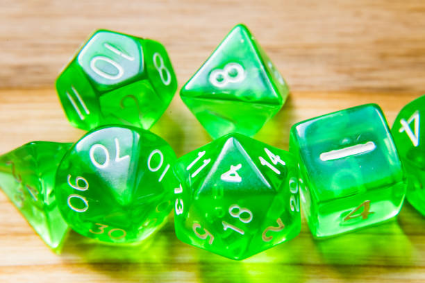 istock A beautiful winning playing dice rolled on a side on wooden table 700814034