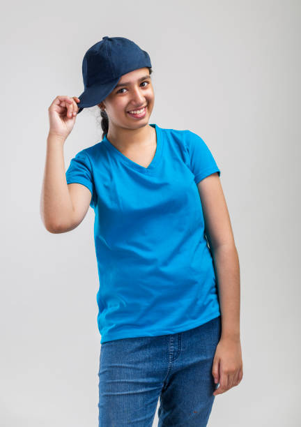 istock girl portrait with cap 700821386