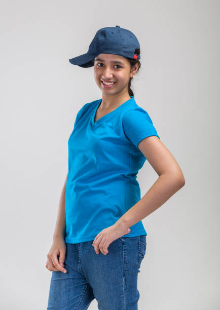 istock girl portrait with cap 700821626