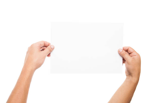 istock Man hand holding blank advertising card on white 700825518