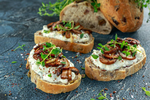 istock Garlic mushroom toast with creamy herbed ricotta chees spread 700828314