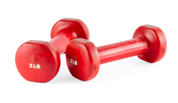 istock Two of red dumbbells, isolated on white background 700834626