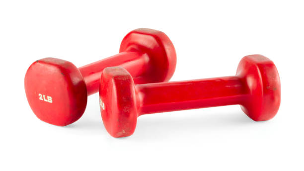 istock Two of red dumbbells, isolated on white background 700834630