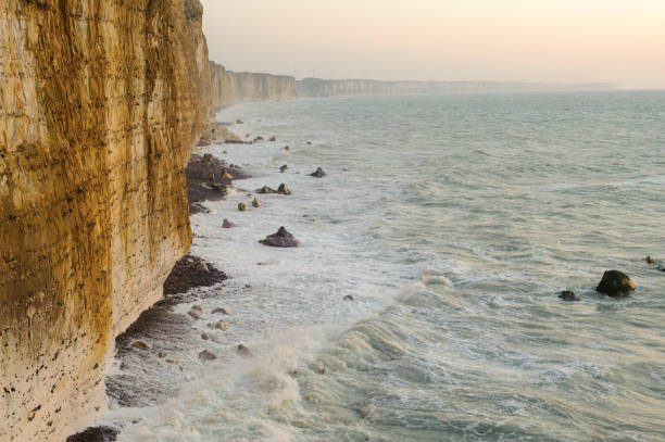 istock Cliffs at the Norman coastline with wild ocean 700842274
