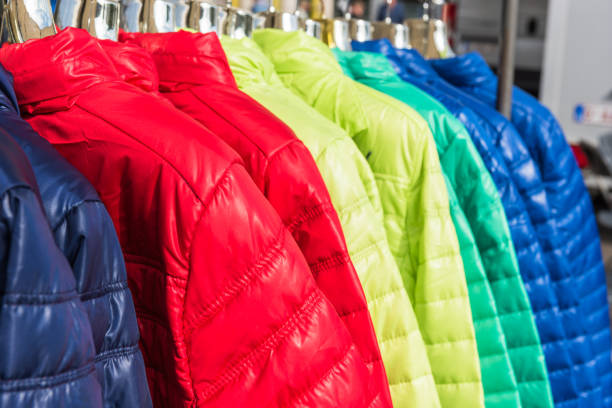 istock Winter clothes hanging at a store 700849776