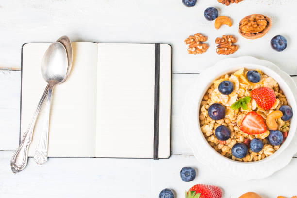 istock crunchy flakes with blueberries and various yogurts for healthy breakfast, close-up 700856206