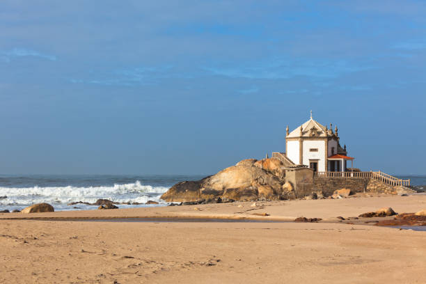 istock White stone chapel on a Portugal coast 700866602
