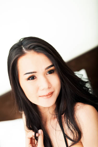 istock Smiling thai kathoey indoors portrait 700871436