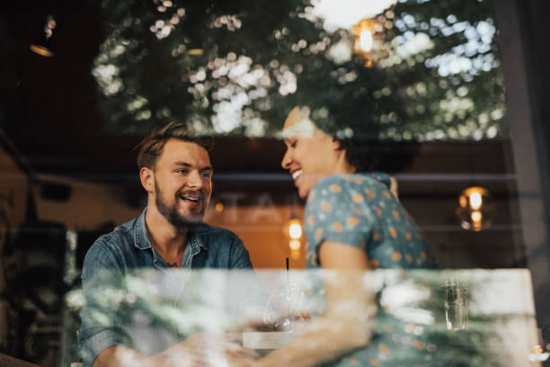 istock Charming couple have a date at the cafe 700876618