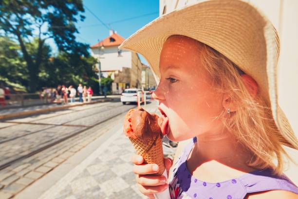 istock Cute girl with ice cream 700884496
