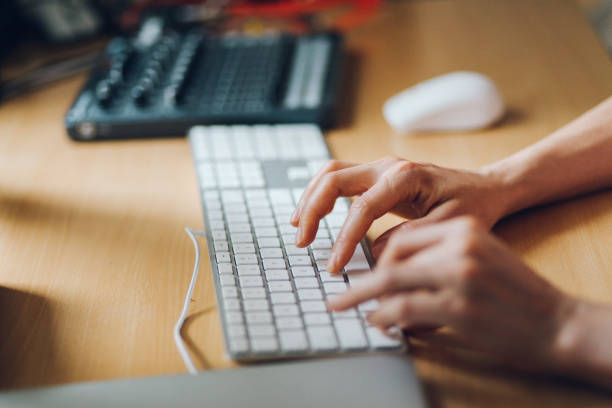 istock Woman working in a home apartment workstudio 700884734