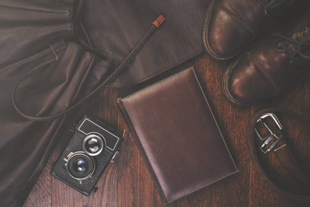 istock Scatter of items on wooden floor 700896140
