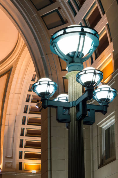 Lamp post near Rowes Wharf rotunda Boston, Massachusetts, USA - January 19, 2017: Lamp post near Rowes Wharf rotunda on Boston waterfront harborwalk stock pictures, royalty-free photos & images