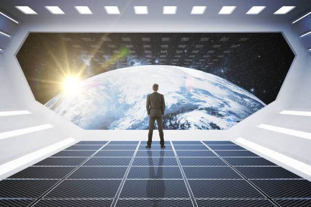 istock Businessman looking at globe 700918750
