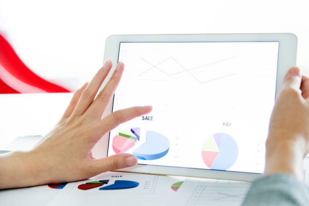istock Businesswoman holding a digital tablet working 700931536