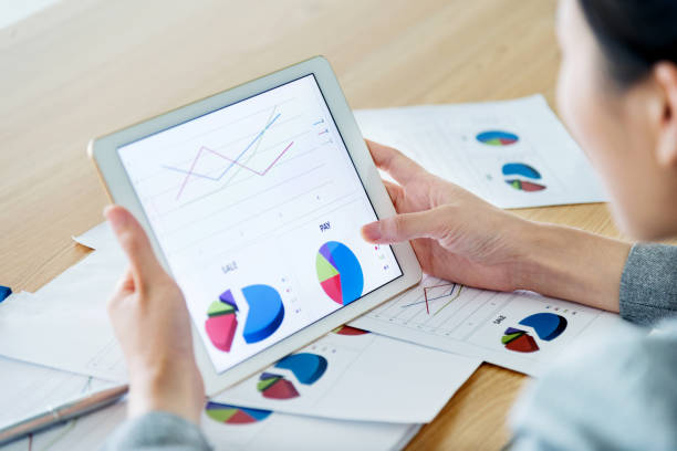 istock Businesswoman holding a digital tablet working 700931538