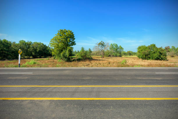 istock Asphalt road and countryside views 700931616