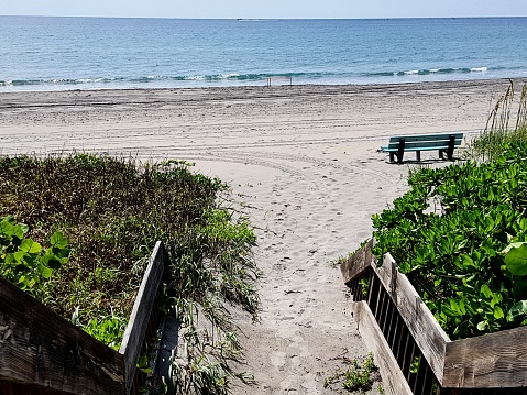 The wooden path leading to the beach in Boca Raton, Florida