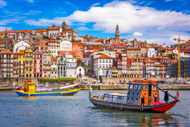 Porto, Portugal Skyline Porto, Portugal old town skyline from across the Douro River. portugal photos stock pictures, royalty-free photos & images