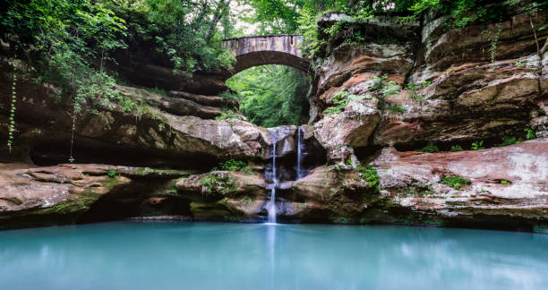 stone bridge with waterfall - columbus park imagens e fotografias de stock
