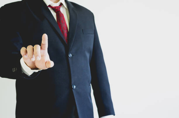 istock Businessman pointing in the air 700974536